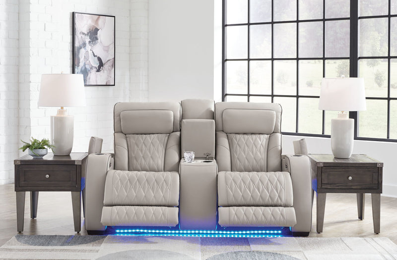 Boyington - Power Reclining Loveseat with Console/Adj Hdrst - Gray