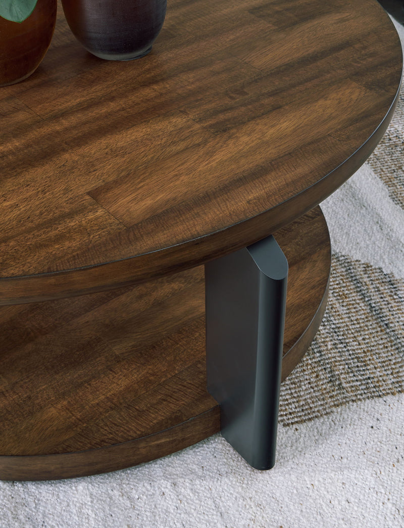 Kraeburn - Round Cocktail Table - Brown / Black