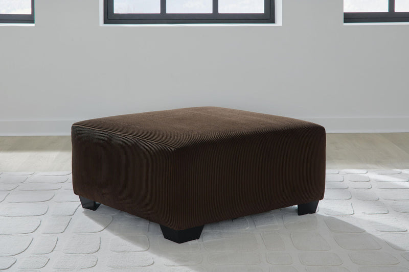 Kimlee - Sectional And Ottoman Set